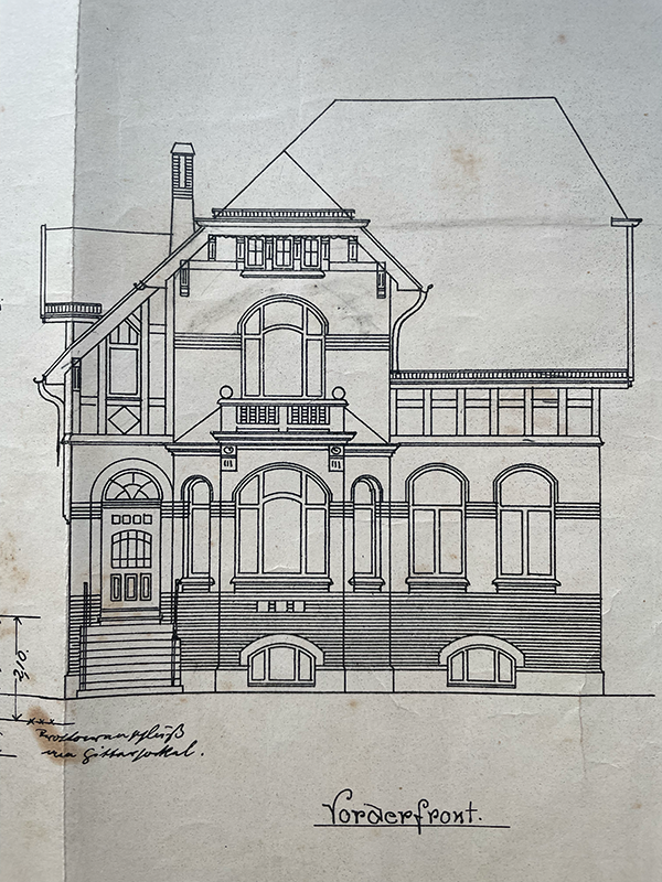 Architectural drawing of a two-story house front elevation with detailed windows, doors, and roof structure labeled 'Vorderfront'.
